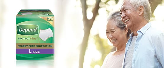 elderly couple smiling outdoors with Depend protection Pants product pack, and a 'learn more' button elderly couple smiling outdoors with Depend protection Pants product pack, and a 'learn more' button